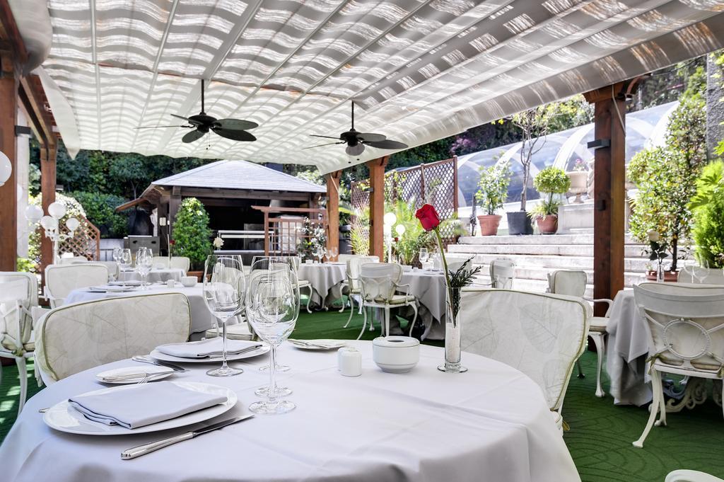 Hotel Miguel Angel Madrid Exterior photo The restaurant