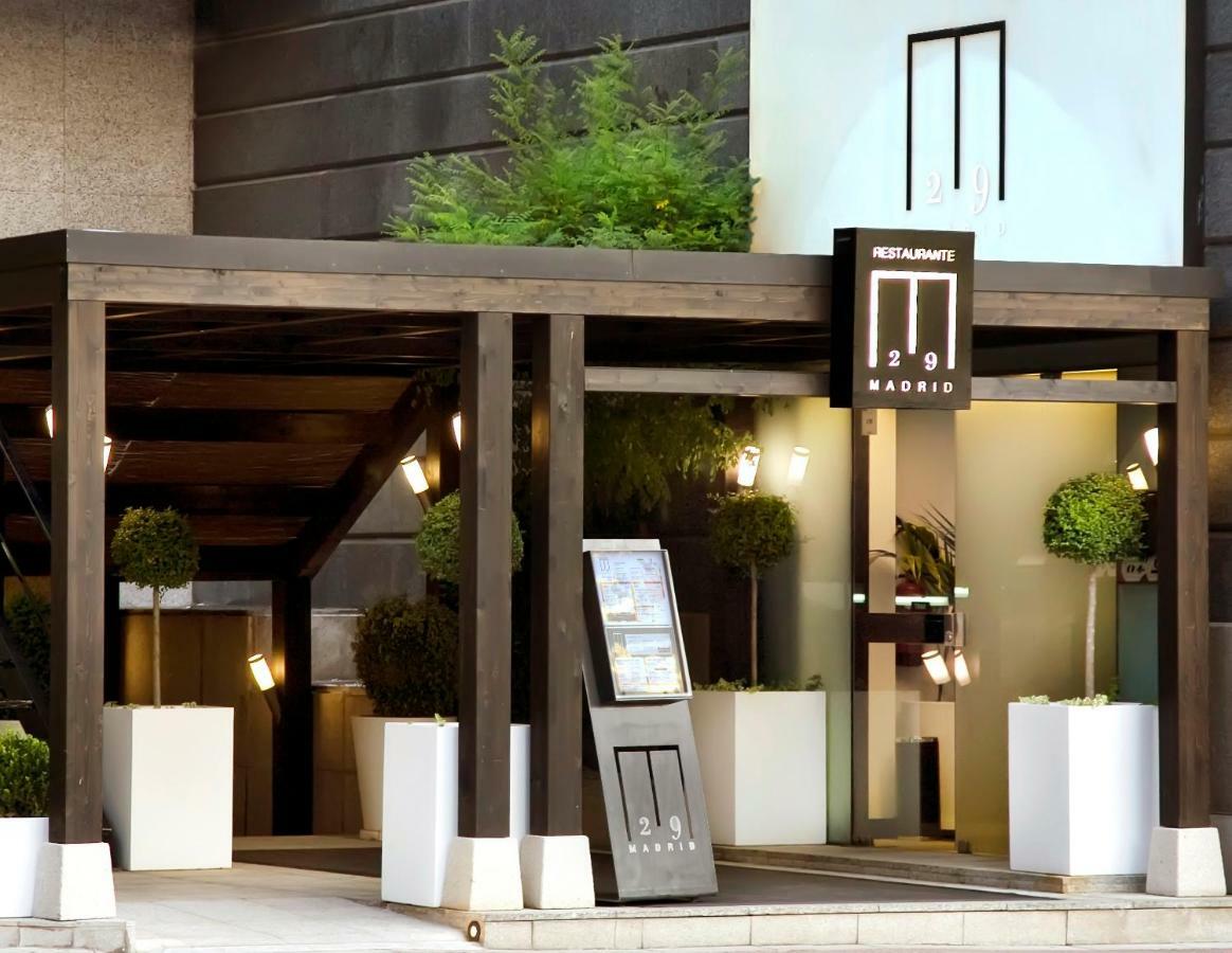 Hotel Miguel Angel Madrid Exterior photo Entrance of the hotel